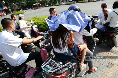 高清 广西多地拉响高温预警 南宁市民武装抗 热