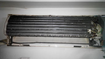 空调挂机清洗,如图已经把空调的面板导风叶片接水槽拆下,空调的蒸发器和风轮是不是只要用清洗剂喷洒上, 
