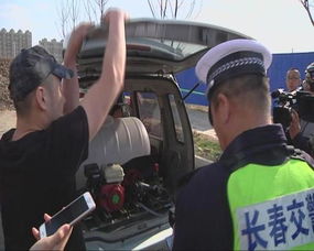 长春市城管交警突击检查 三处占道洗车被查处