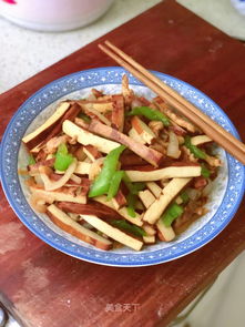 切豆腐干青椒肉丝怎么切,熏血豆腐干怎么做好吃
