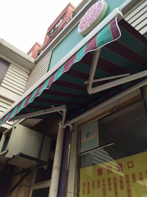 店面门口阳光太强怎么遮阳(店门口挡太阳用什么好)