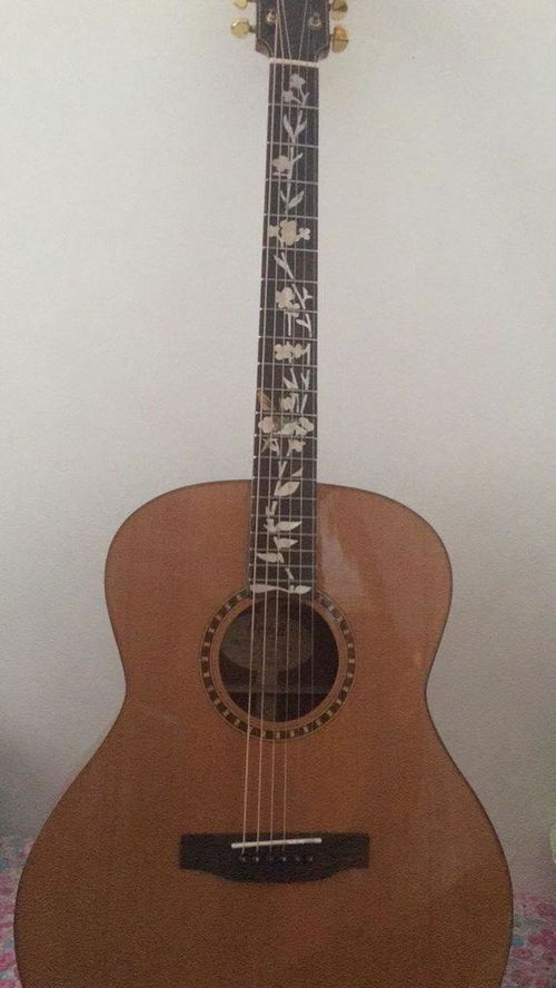 请问 bedell全单吉他 上弦枕后侧 和面板有裂纹 能修好么 去琴行或者自己修能修好么 