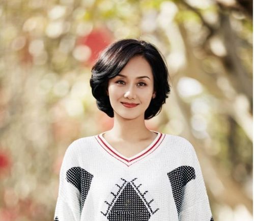 儿子是一线明星,女儿是奥运冠军,52岁的她才是真正的人生赢家