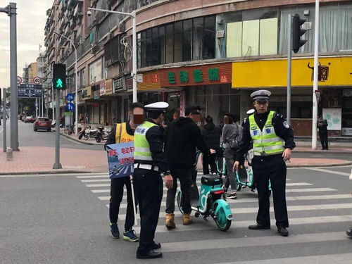 单车 电动自行车横过马路要下车推行,否则