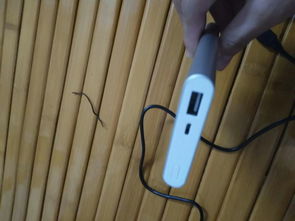 我刚刚买了书包里面有充电的USB 所以怎么弄 电头前面后面是大的 我手机电头是小的 