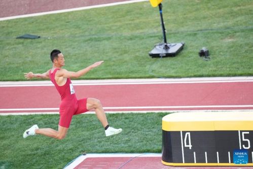 Wang Jianan takes historic long jump gold for at athletics worlds English 